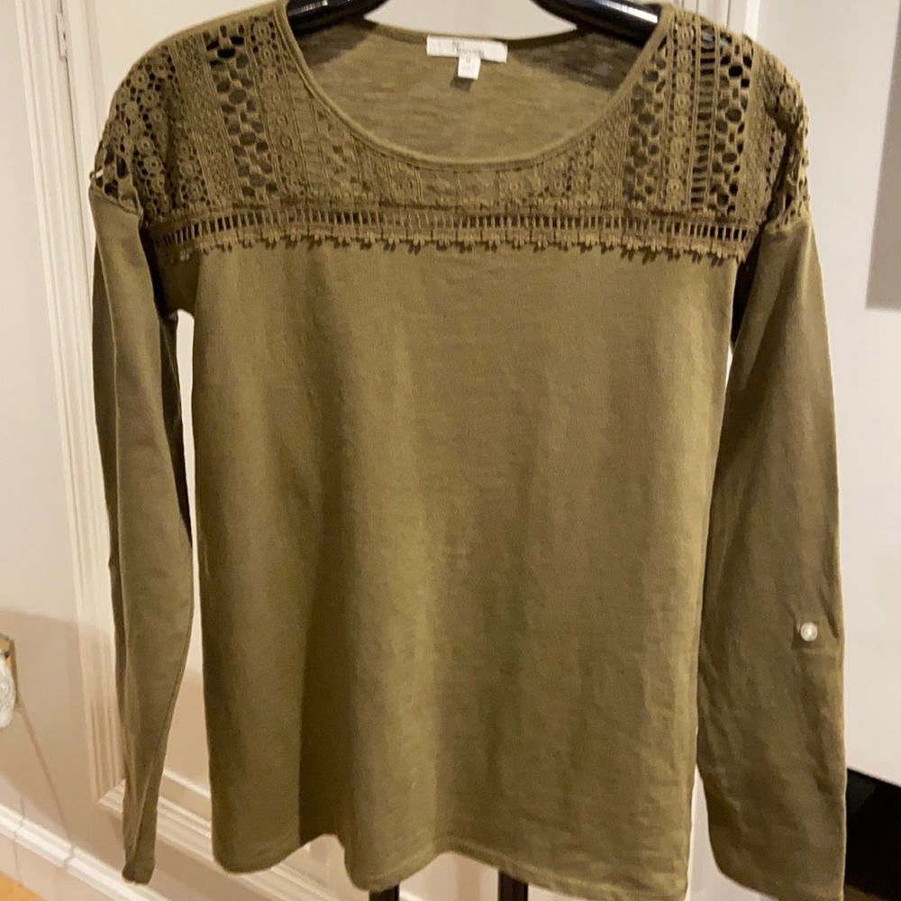Crochet neckline tee.